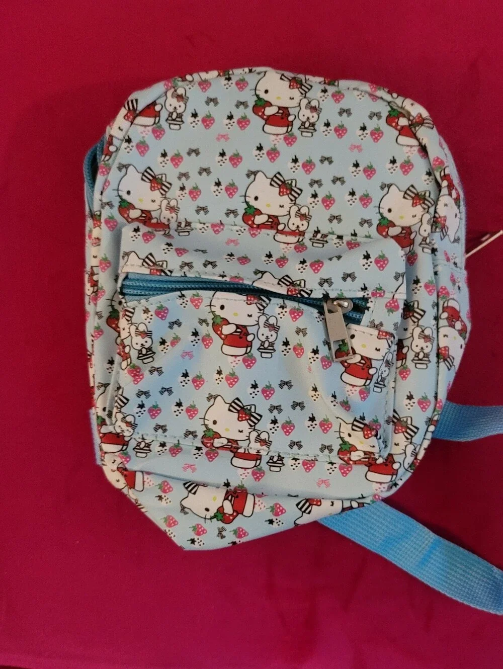 Mini Backpack In Blue With Hello Kitty On It